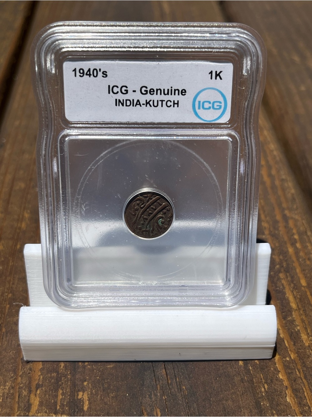ICG-Certified India-Kutch Coin in Clear Holder - Black/Silver
